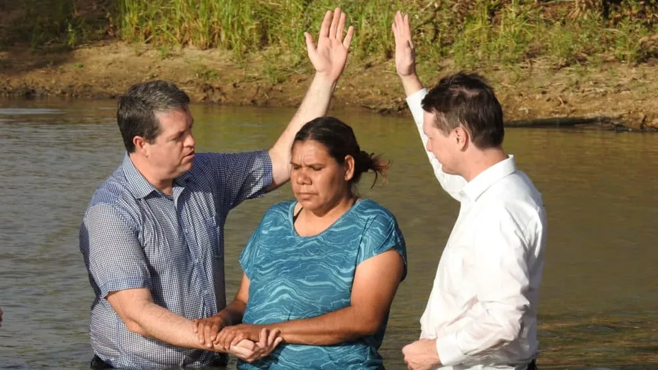 Lady being baptized