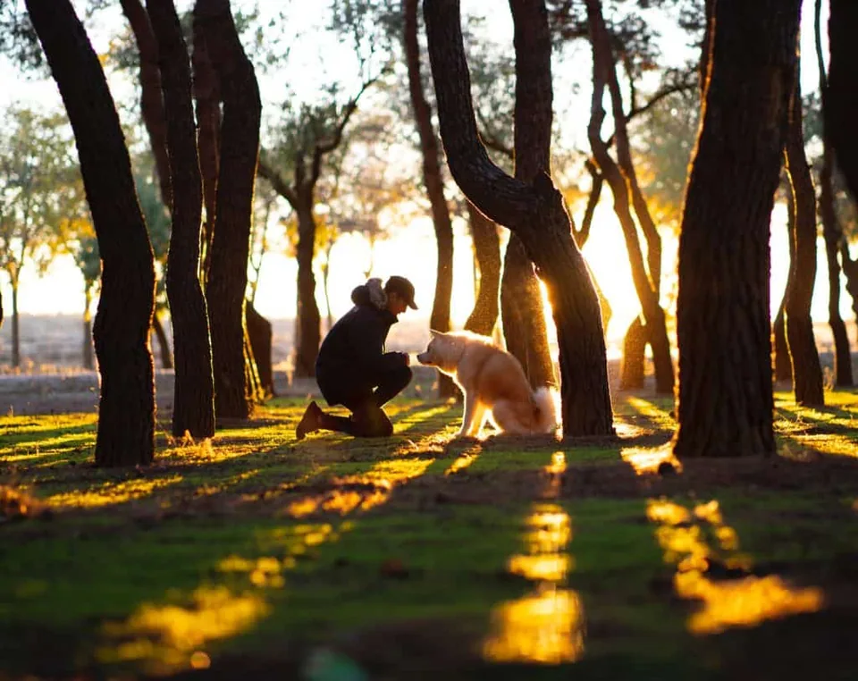Man holding dog