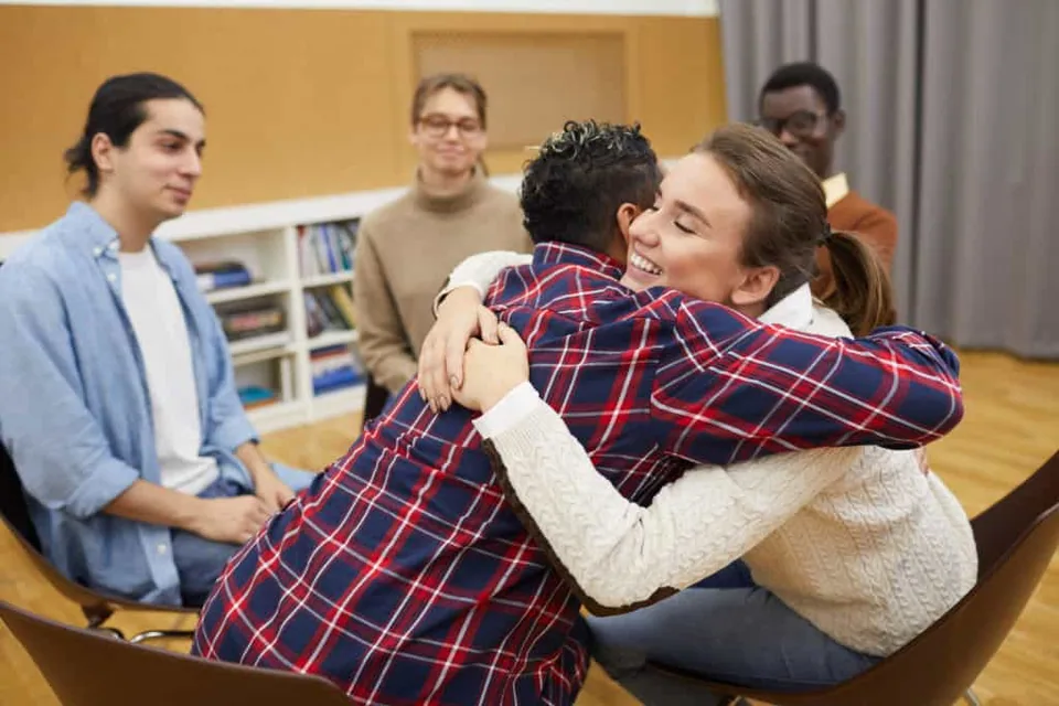 People hugging each other