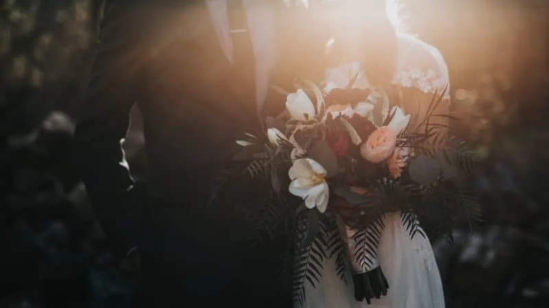 Bride and Groom holding each other