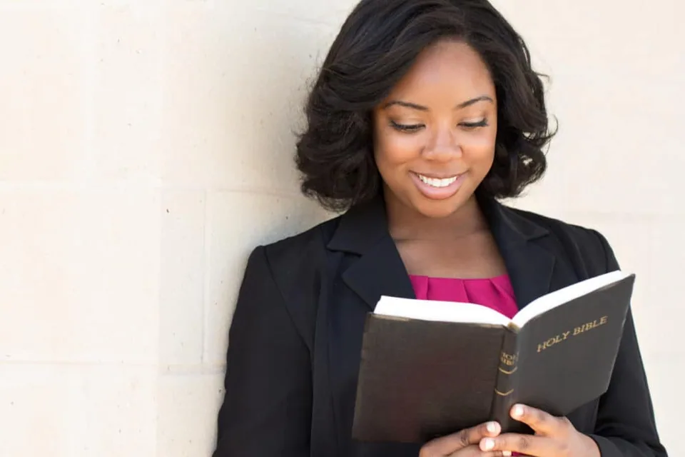 A lady reading the Bible