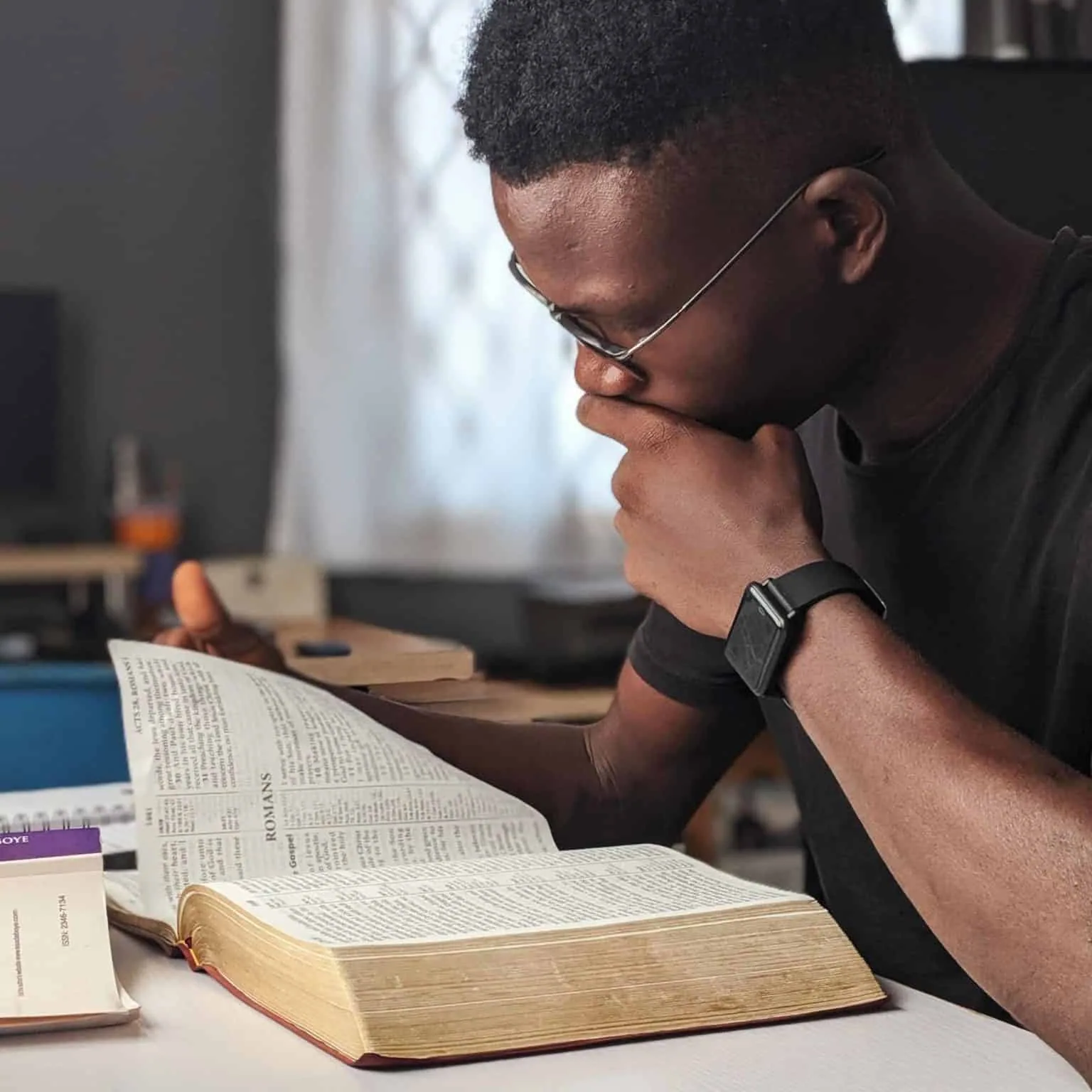 man reading bible
