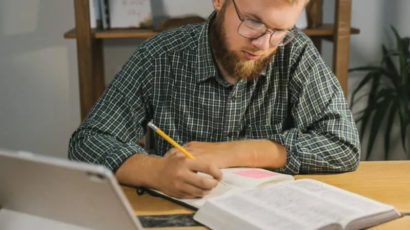 man studying Bible