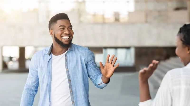 Man waving hand