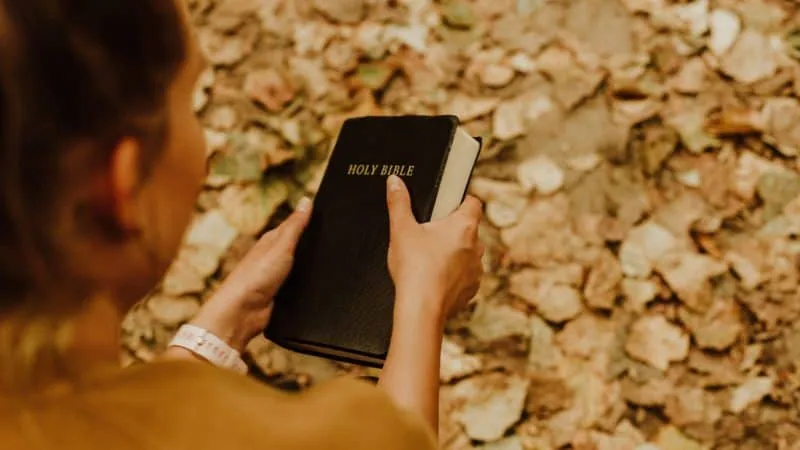 Lady holding Bible