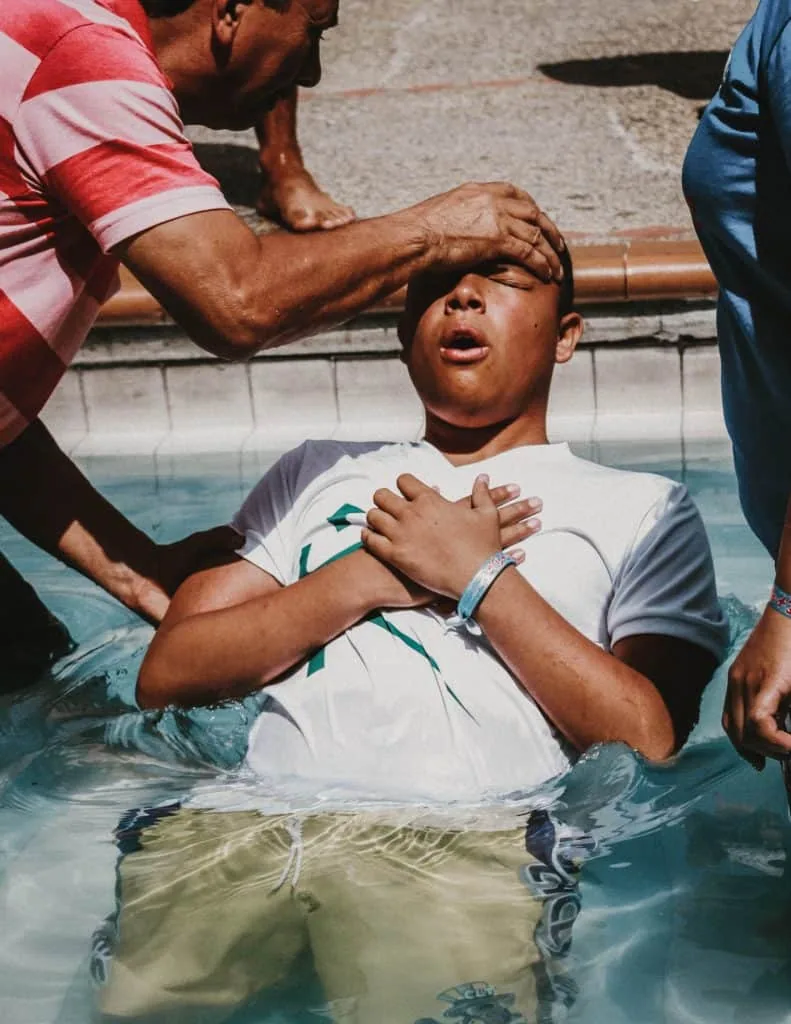People being baptized