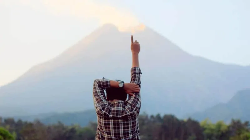 A person lifting up hands