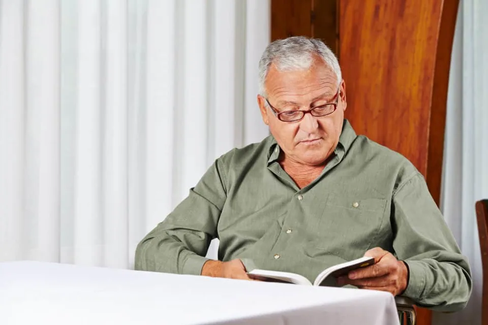 Senior man reading a book