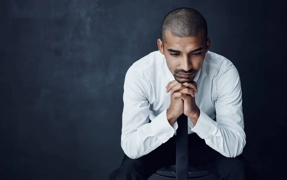 A man in deep thoughts
