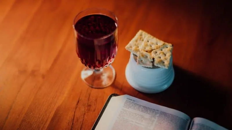 A glass of pure grape juice and bread