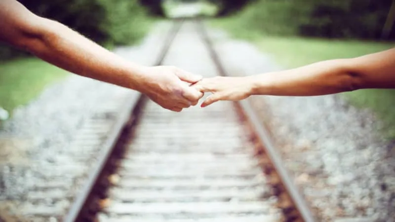 Hands holding each other