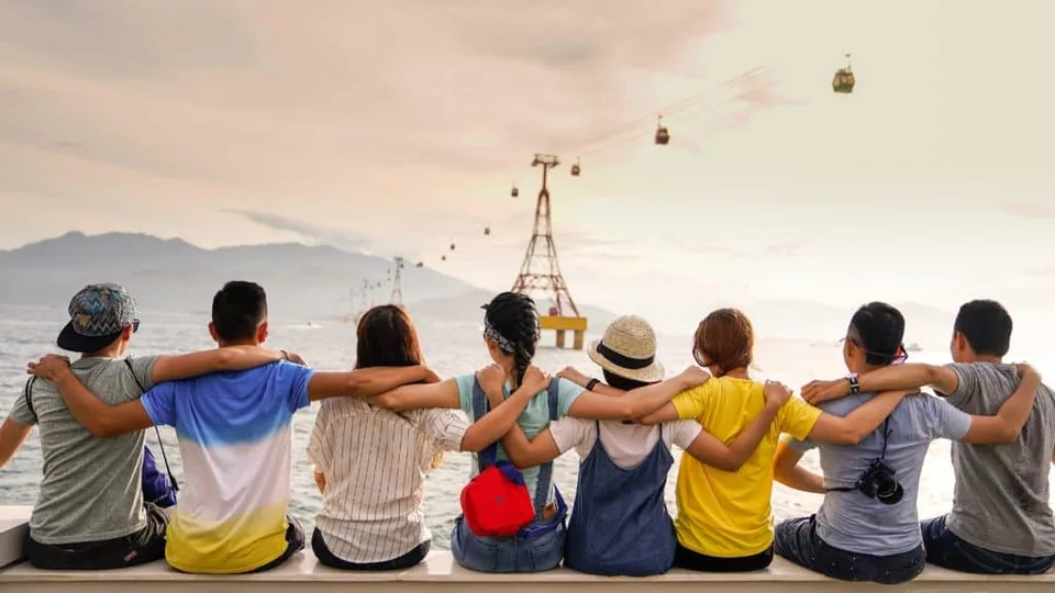 A group of people embracing each other